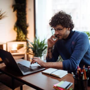 young professional working from home office