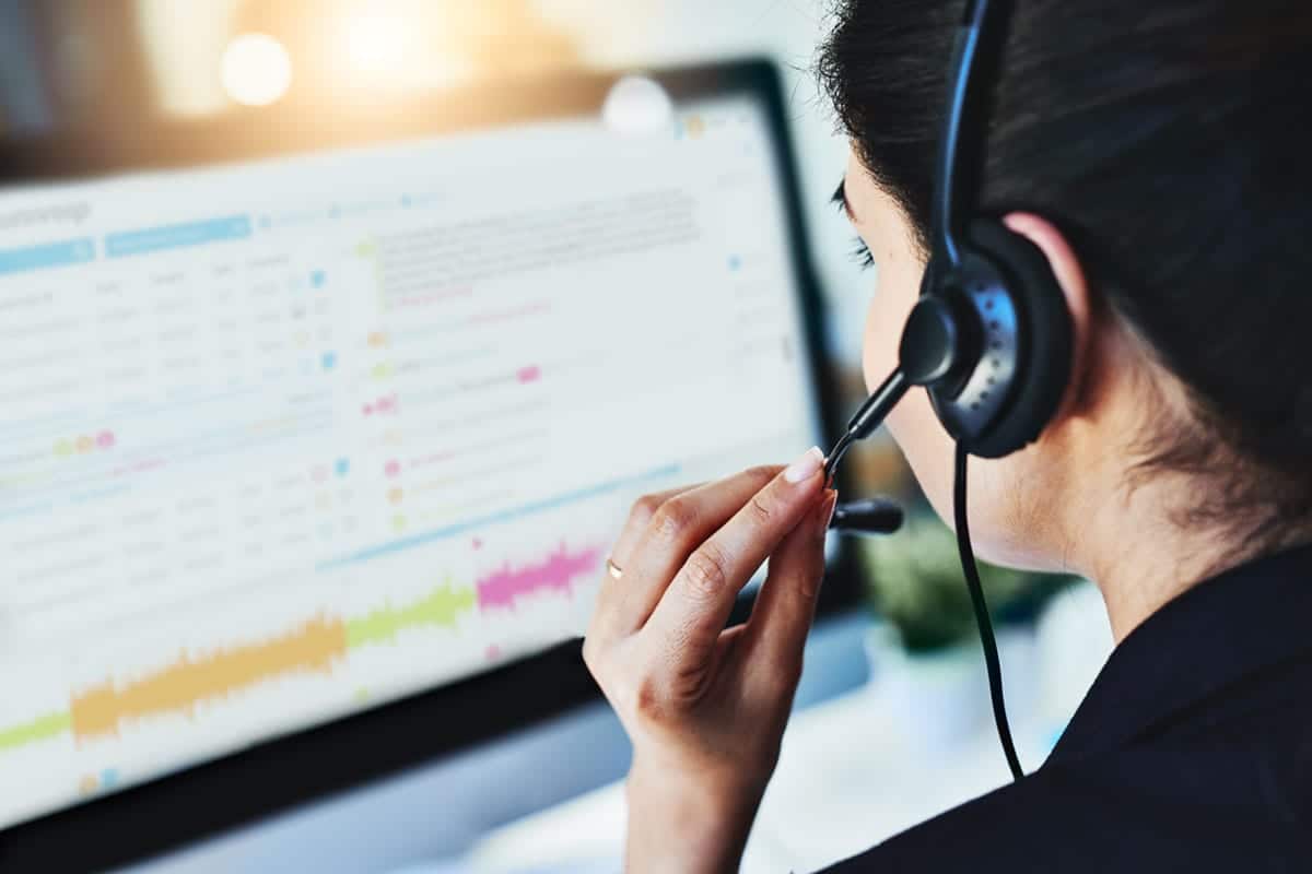 Woman with headset using contact center